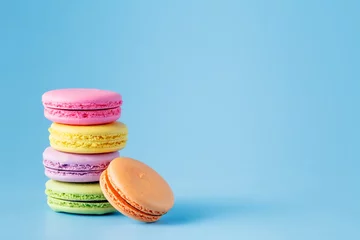 Poster Colorful macaron on blue © Andrey Cherkasov