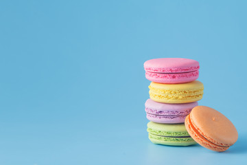 Colorful macaron on blue