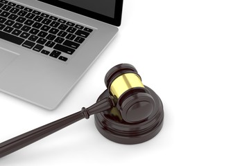 Gavel and laptop. 3D rendering.