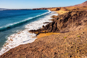 Papagayo beach near Las Coloradas resort on the south of Lanzarote island in Spain