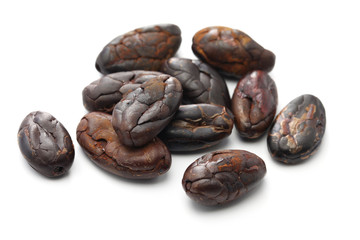peeled roasted cacao cocoa beans on white background