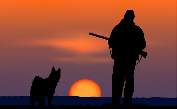 hunter with dog in the evening