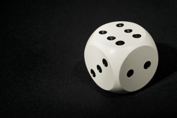 White Dice On Black Background