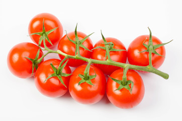 photo of very fresh tomatoes presented on white background