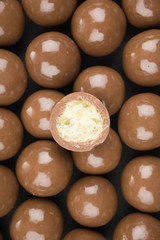 chocolate balls on a black background