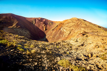 Volcanic landscape in Tmanfaya national park on Lanzarote island in Spain