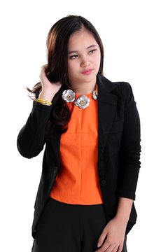 Young businesswoman looking sideways isolated