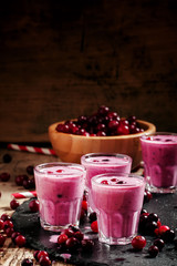 Milk shake with berries: cranberries, red and black currants, bl