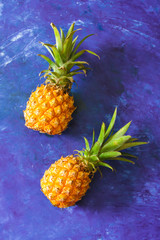 ripe pineapple on a blue background
