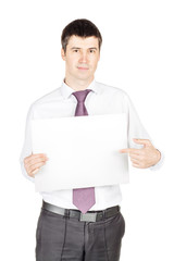 Portrait of young business man holding a blank banner. 
