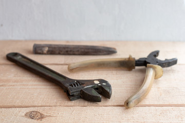 old tools on a wooden table
