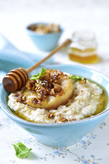 Oat porridge with caramelized pear and walnuts.
