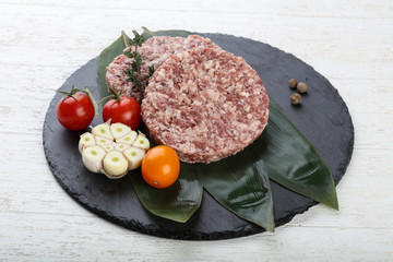 Raw burger cutlet