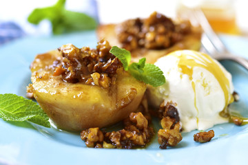 Grilled pear with caramelized walnuts and honey. - obrazy, fototapety, plakaty