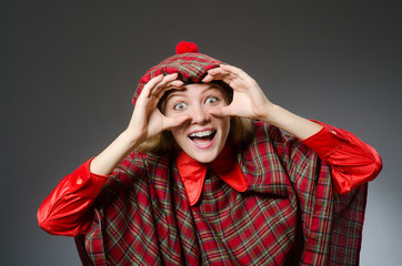 Woman wearing traditional scottish clothing