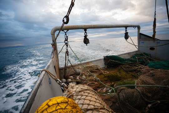 Fototapeta Fishing nets and rigging at the stern of a fishing vessel