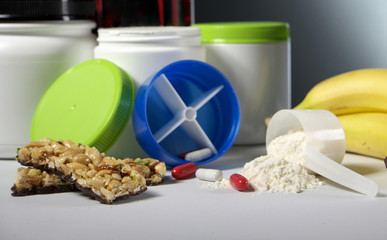 Sport Nutrition Supplement containers with pills