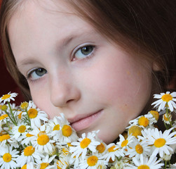 The portret of teenage girl with chamomile © diesel_80