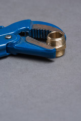 Adjustable wrench and plumbing nipple