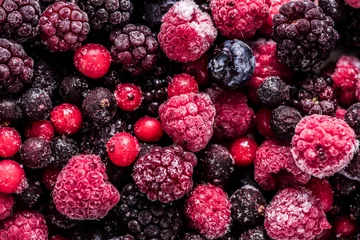 Poster Frozen summer forest wild berries fruits, full frame background © marcin jucha