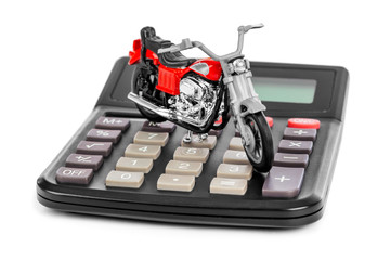 Fototapeta premium Calculator and toy motorbike