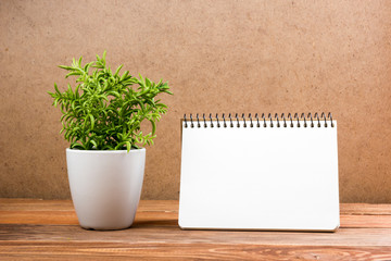White blank paper notepad book at office worplace. Copy space