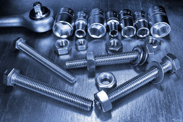 Socket wrench and stainless steel hex sockets with bolts nuts and washers