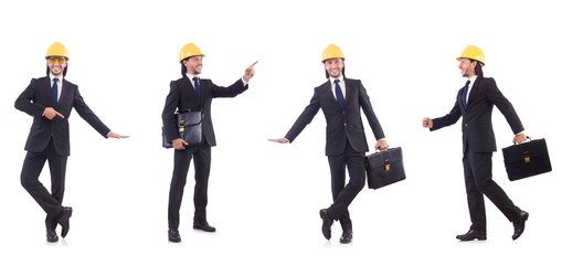 Young architect wearing hardhat on white