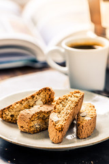Perfect morning awake, book, espresso and cantucci