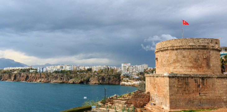 Panoramic view of antalya with the fortress tower in foreground