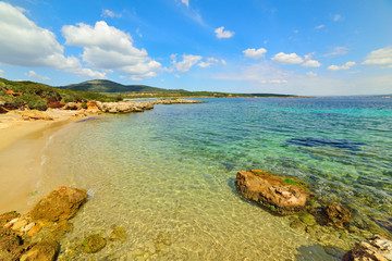 yellow rocks and clear water