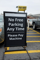 No Free Parking Sign in Parking lot