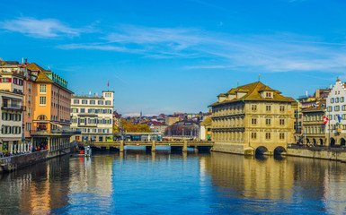 Panoramic view of historic Zurich city center with famous Fraumunster Church and river Limmat on a...