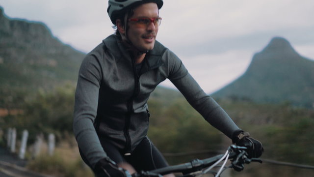 Professional cycling sport enthusiast with proper protective wear 
