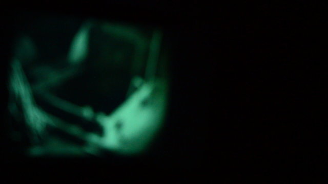 Old movie projecting over cinema screen blured