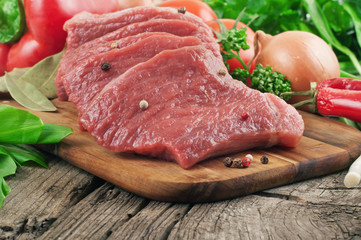 fresh raw meat with vegetables