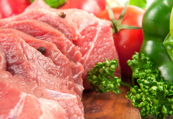 fresh raw meat with vegetables