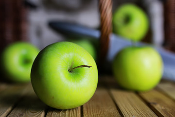 green apple in a basket