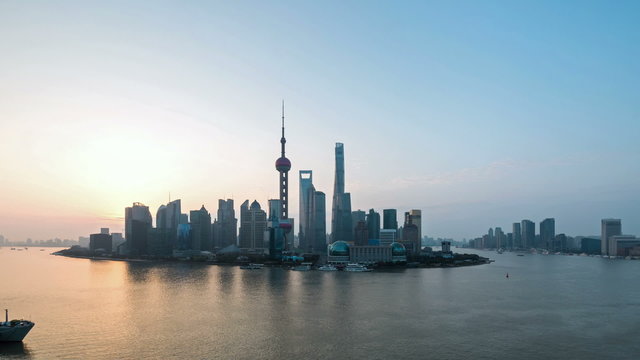 time lapse of the huangpu river and pudong skyline in the early morning, shanghai in sunrise