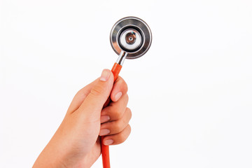 Medical equipment, Hand holding a stethoscope isolated on white background.