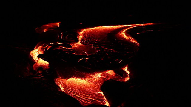 Flowing lava close up, Lava - Kilauea volcano, Hawaii. Lava stream flowing in time-lapse from Kilauea volcano around Hawaii volcanoes national park, USA.