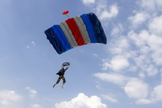 Piloting the parachute in the clouds.