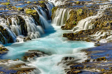 Fototapeta na wymiar Detail of the lovely Bruarfoss waterfall in Iceland
