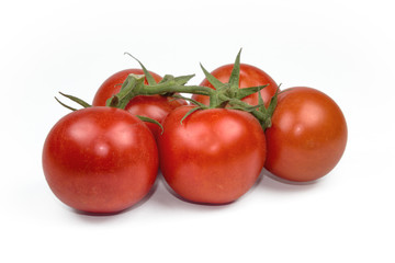 Red fresh tomatoes isolated on white background