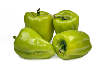fresh green bell pepper (capsicum) on a white background
