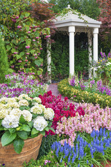 pavilion in beautiful flower garden