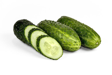 Cucumber and slices isolated over white background