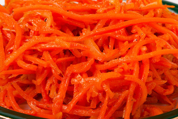 Hot carrot salad in  plate  on white background