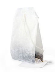 One tea bag on white background