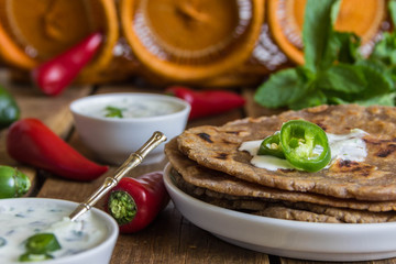Tortilla  chapati with sauce Raita, chilli. Indian cuisine